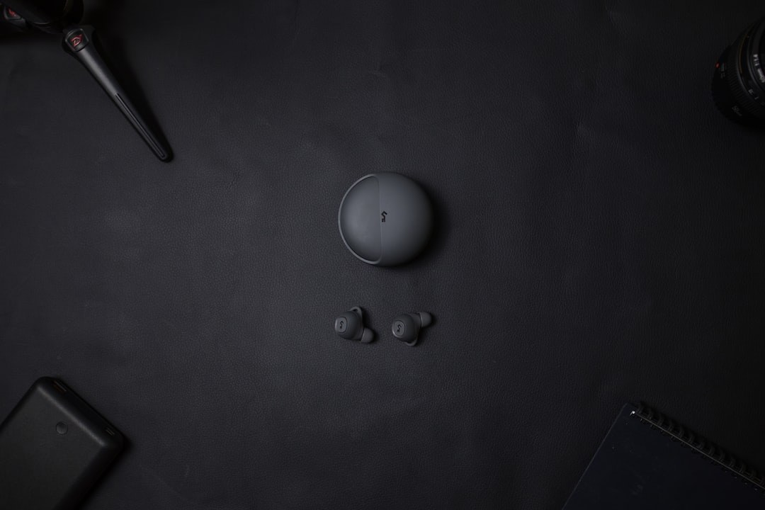 earbuds black workspace minimal